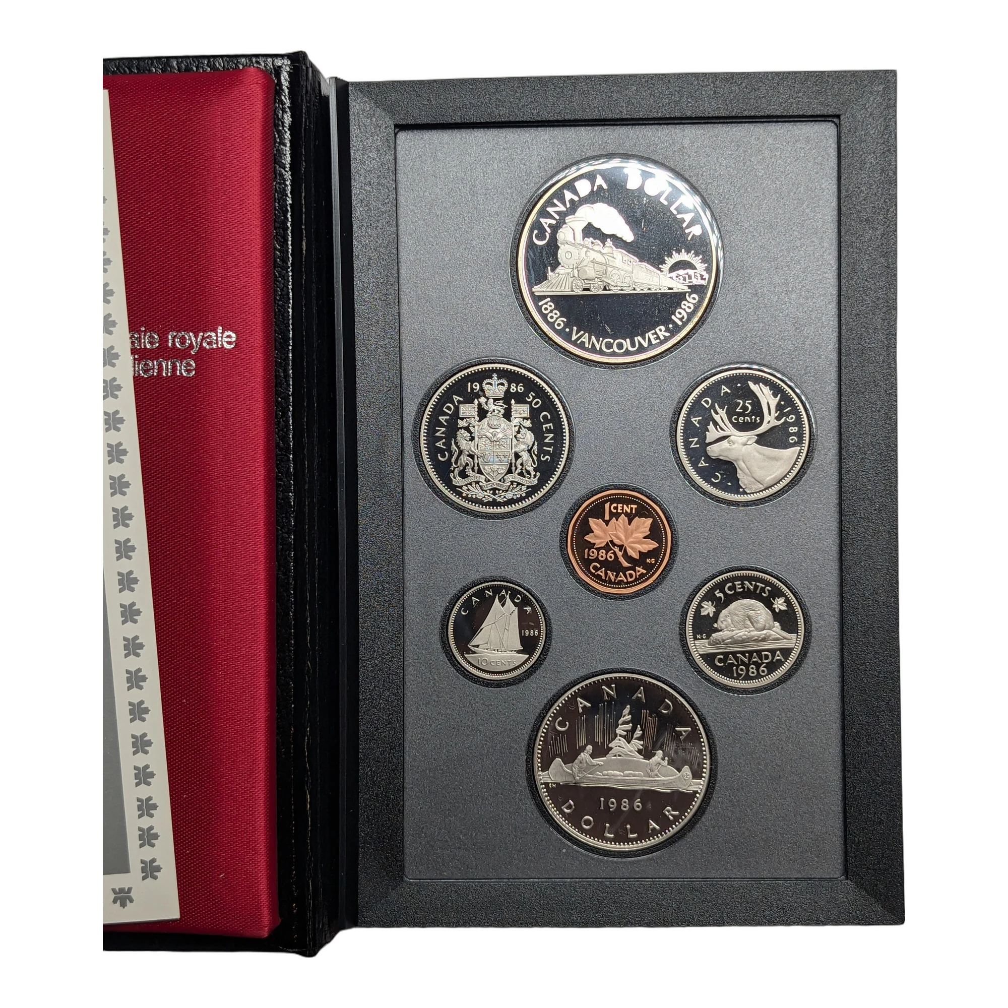 The set open, reverses of all seven coins