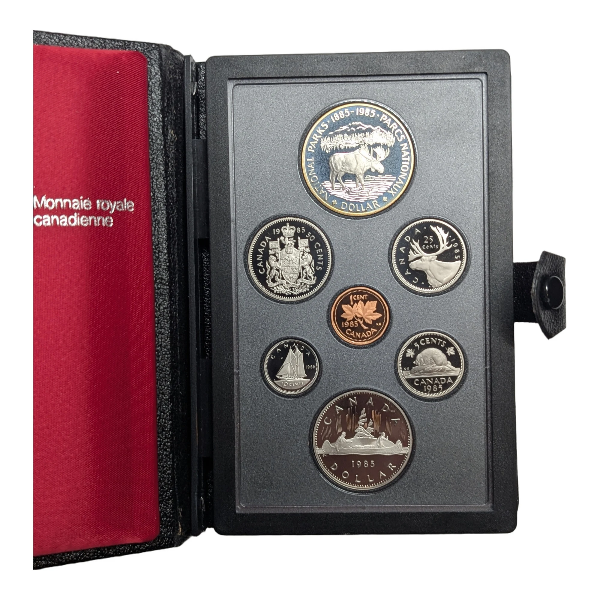 The set open, reverses of all seven coins