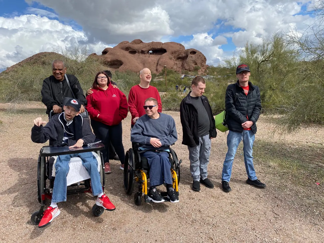 Group of participants gathering outdoors during a Chandler/Gilbert Arc community outing