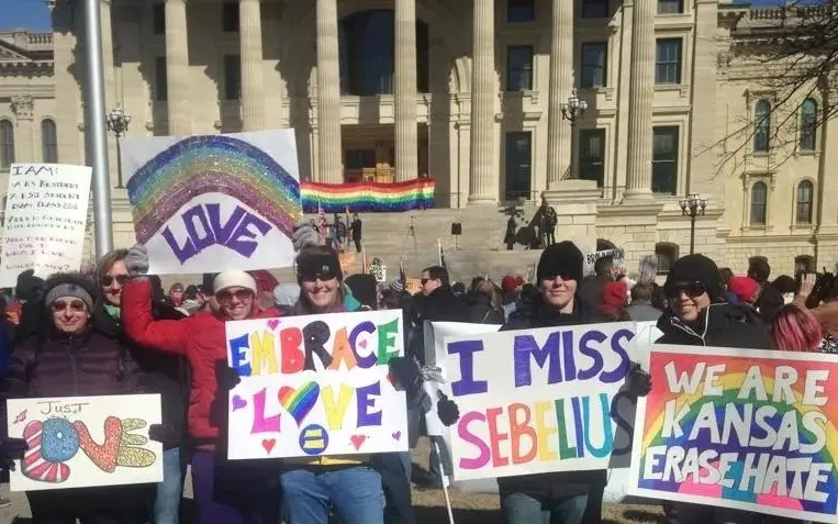 Advocates demonstrating for equality and civil rights during a rally at the Kansas Statehouse