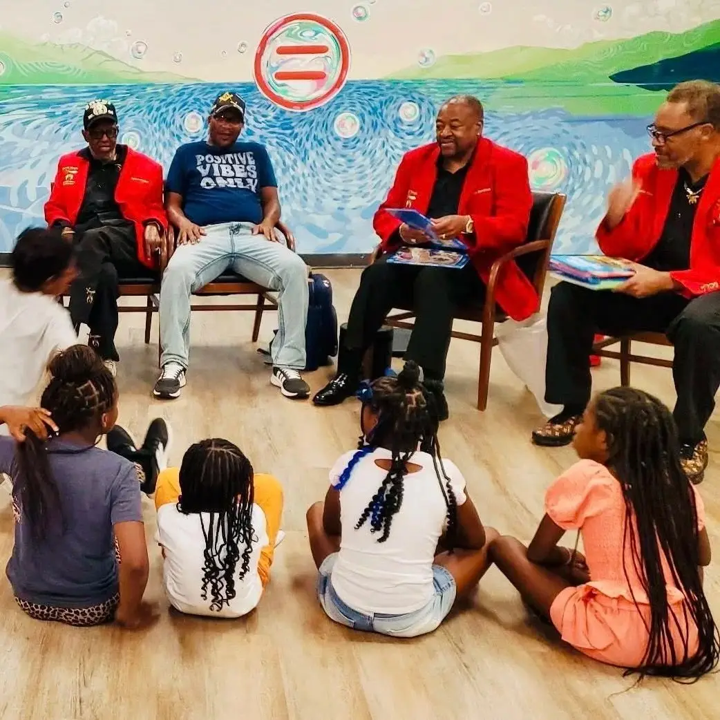 Students engaged in after-school tutoring and hands-on learning at the Urban League facility