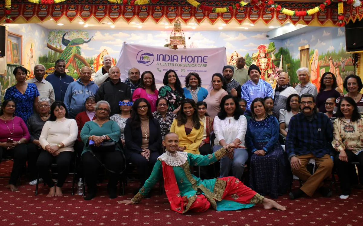 South Asian older adults and staff gathered for a program at India Home senior center
