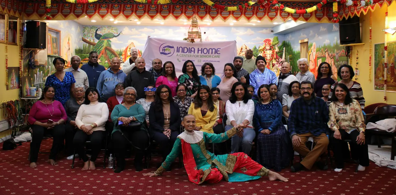 South Asian older adults and staff gathered for a program at India Home senior center