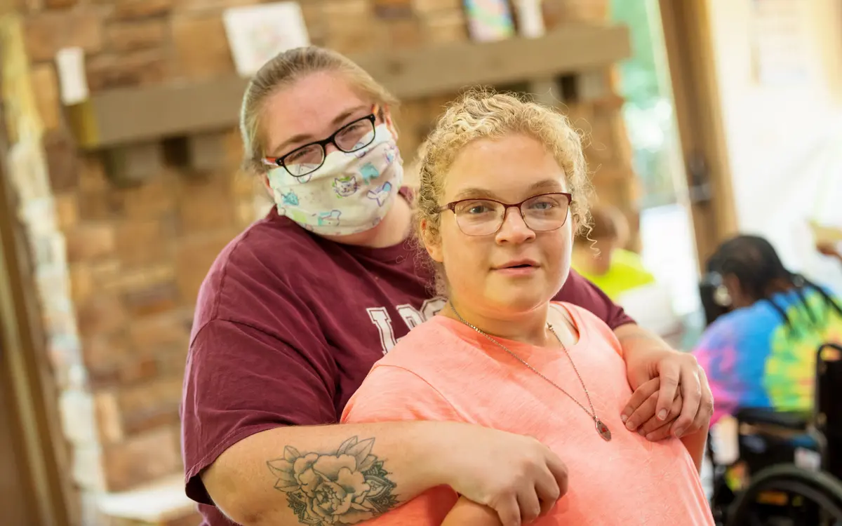 Program participants engaged in interactive daily enrichment activities at LOGAN Center