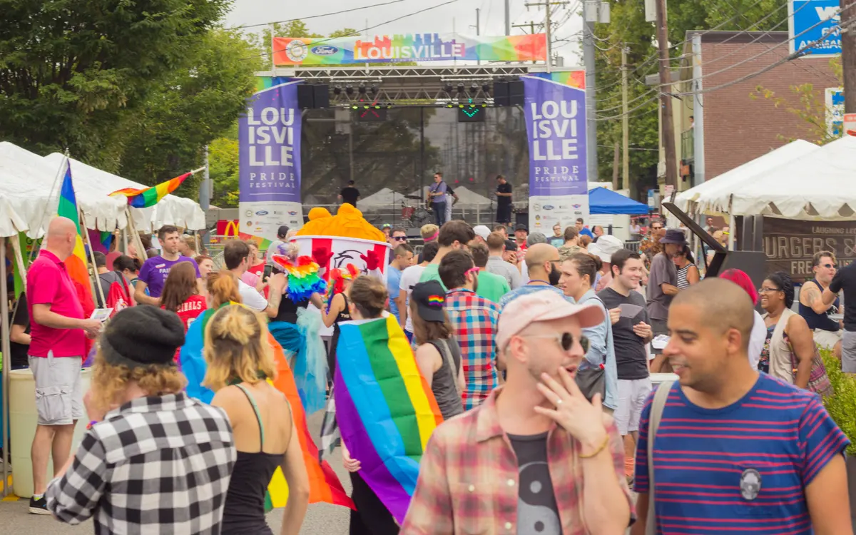 Crowd gathered before the main entertainment stage during the annual Louisville Pride Festival on Bardstown Road
