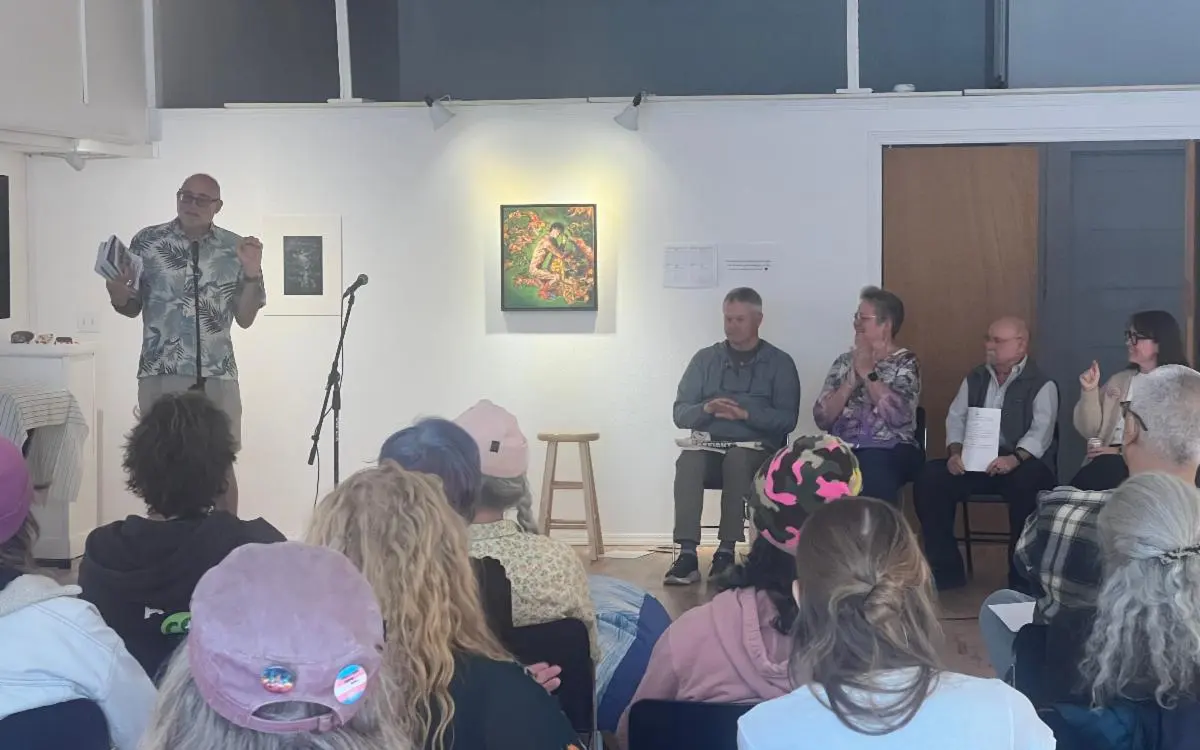 Storytellers and community members gathered for an Our Bold Voices storytelling event at Lower Columbia Q Center