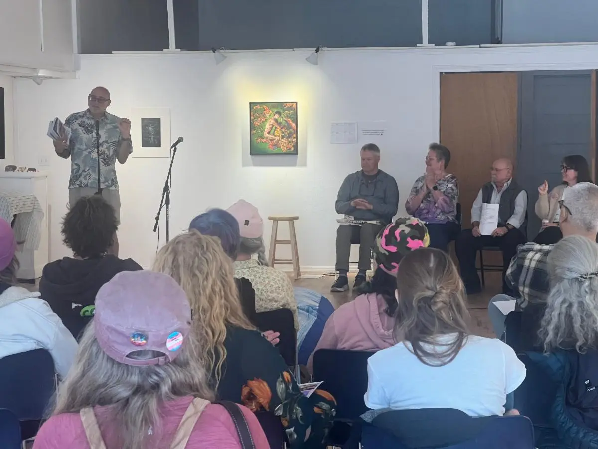 Storytellers and community members gathered for an Our Bold Voices storytelling event at Lower Columbia Q Center