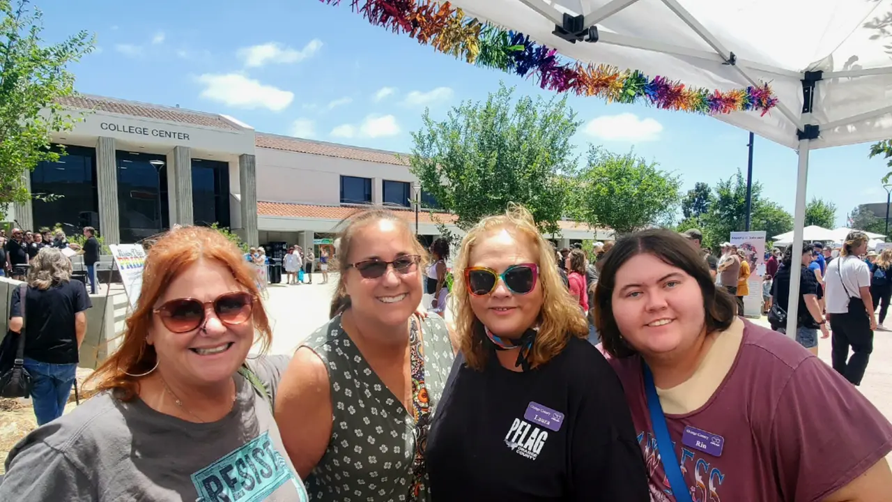 PFLAG Orange County members at their table at a community Pride event