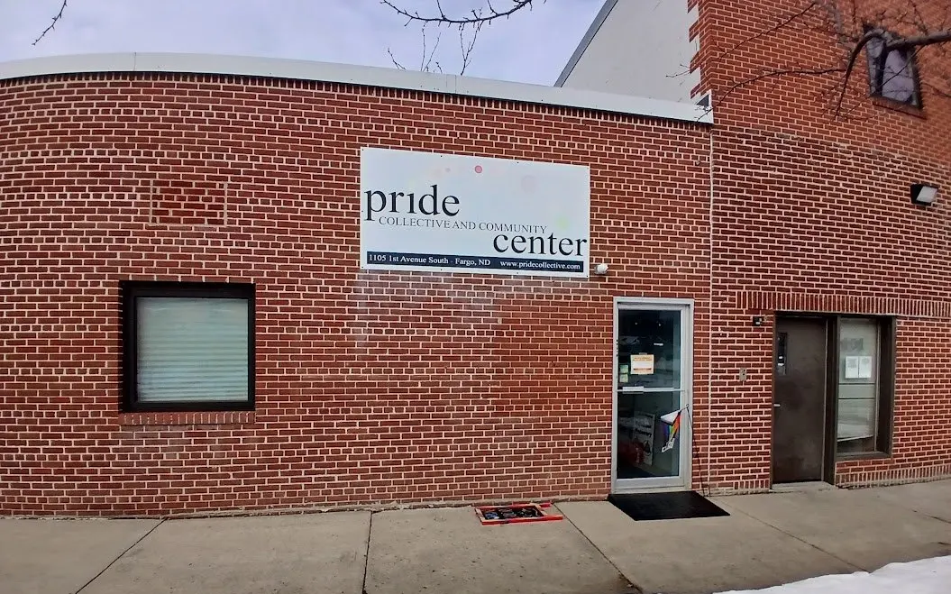 Exterior storefront and sign of the Pride Collective and Community Center in Fargo