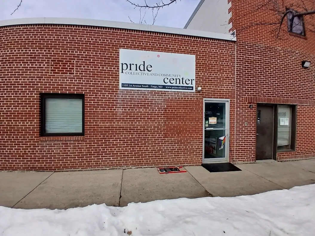 Exterior storefront and sign of the Pride Collective and Community Center in Fargo