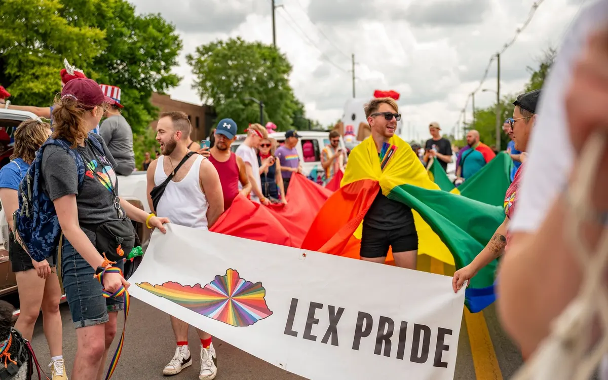 Participants and supporters gather at an outdoor community event hosted by the Lexington Pride Center