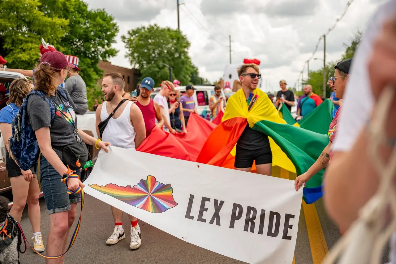 Participants and supporters gather at an outdoor community event hosted by the Lexington Pride Center