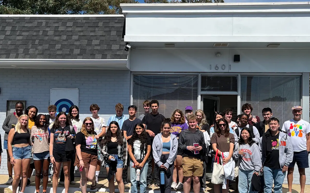 Princeton University students visiting and meeting with community leaders at QSpot LGBT Community Center