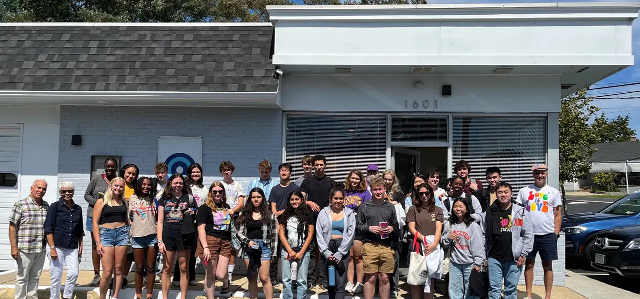 Princeton University students visiting and meeting with community leaders at QSpot LGBT Community Center