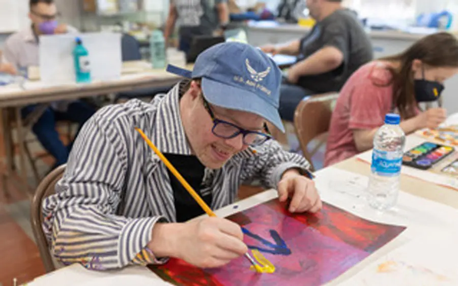 Participants engaging in community programs with The Arc of Benton County