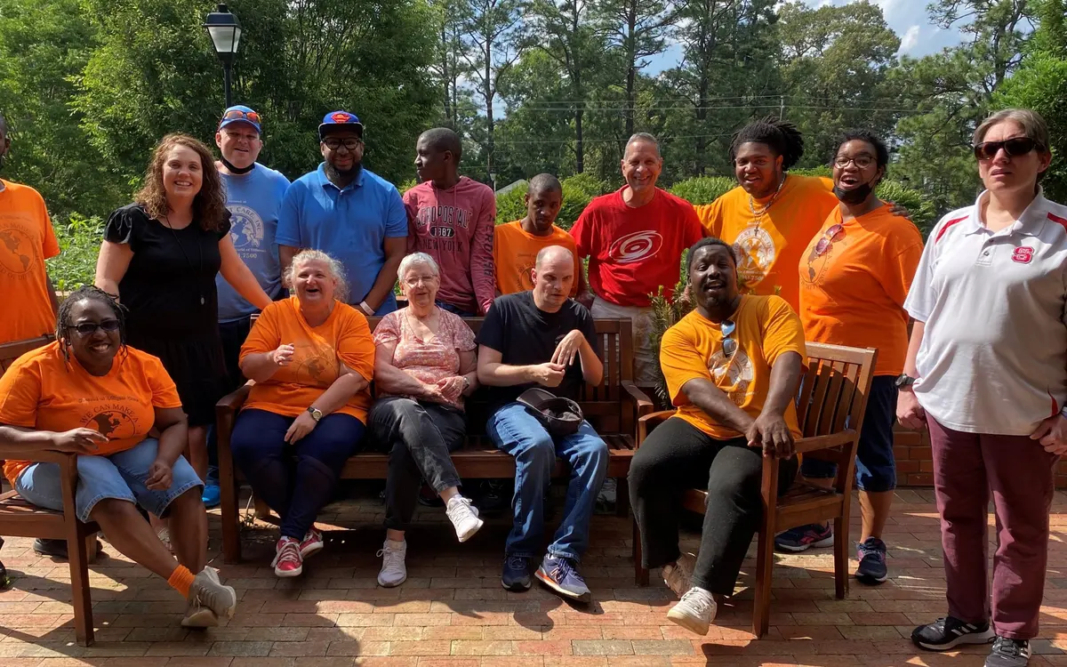 The Arc of Moore County participants and staff gathered outdoors