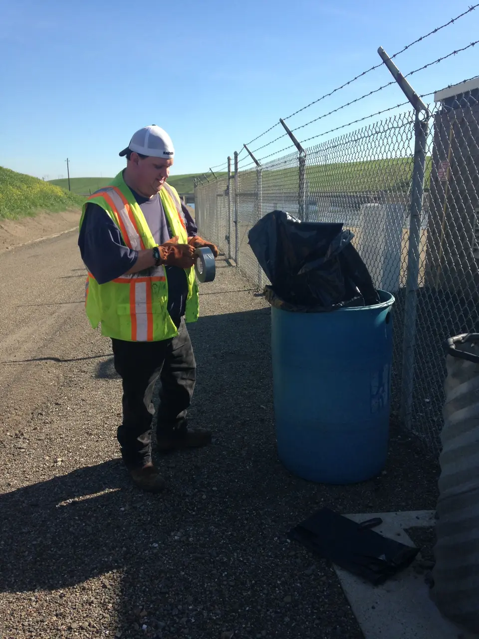 An employment services participant learning workplace skills on the job