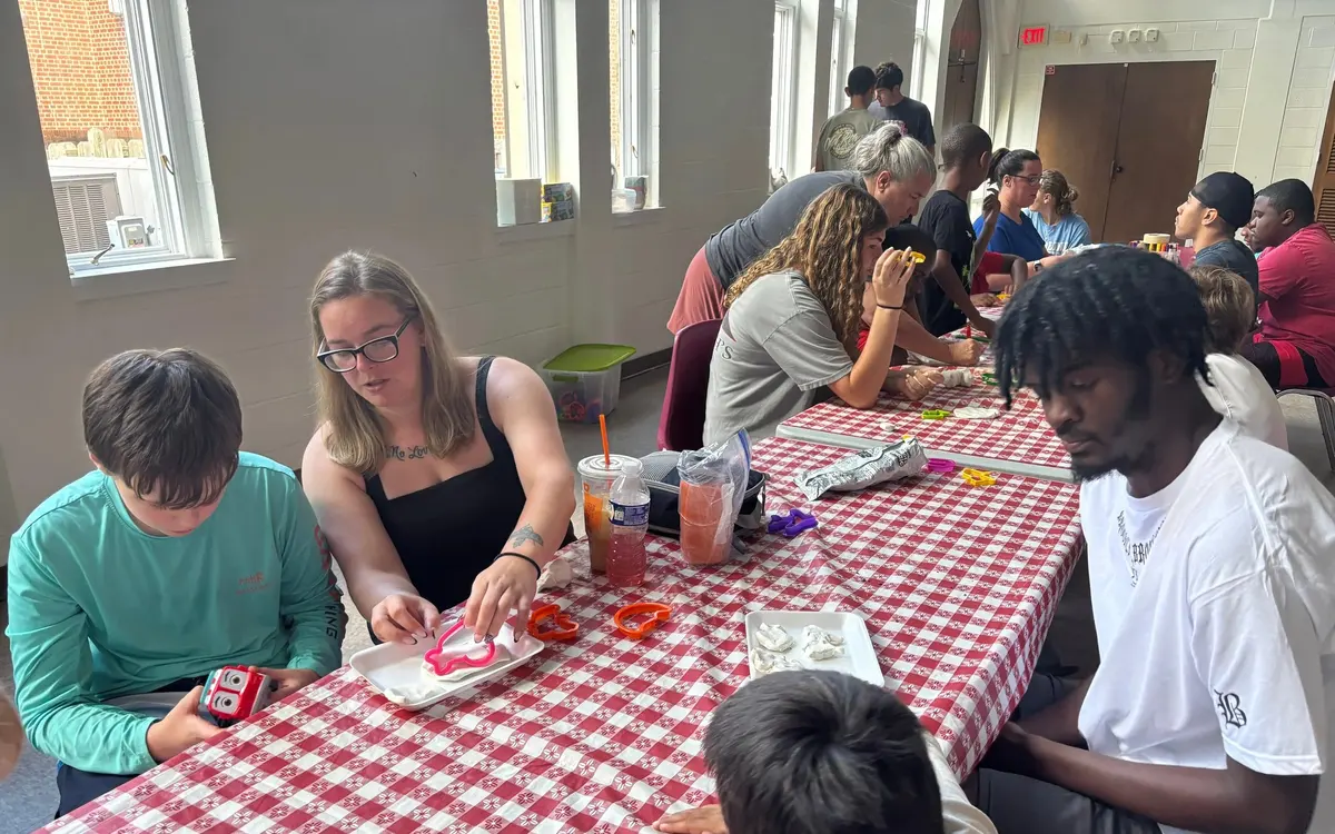 Campers working on craft and art activities at The Arc of Wilson County