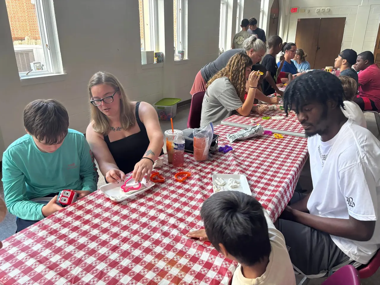 Campers working on craft and art activities at The Arc of Wilson County