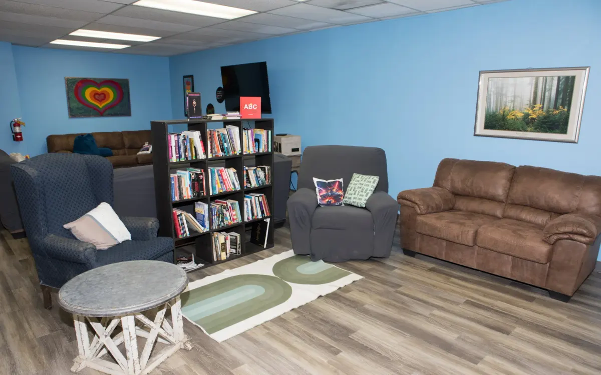 Community members and staff gathering at the Transgender Resource Center drop-in facility