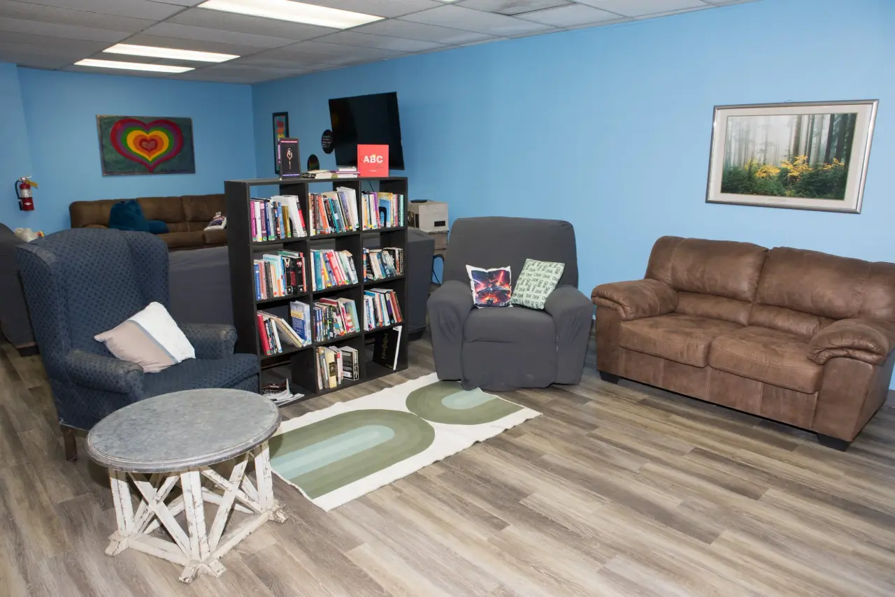Community members and staff gathering at the Transgender Resource Center drop-in facility