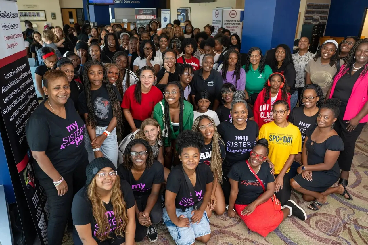 Middle and high school girls and mentors gathered for a group photo at the 2026 PCULempowHER Girls Summit