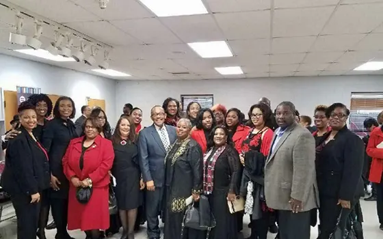 Urban League of Union County team and community members gathered at a program event